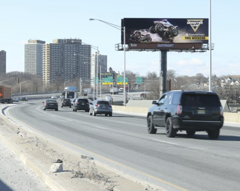 OpAD Media Monster Jam out-of-home billboard advertising campaign on New Jersey highway near Newark — elevated brand live entertainment multicultural outdoor media buying and destination marketing