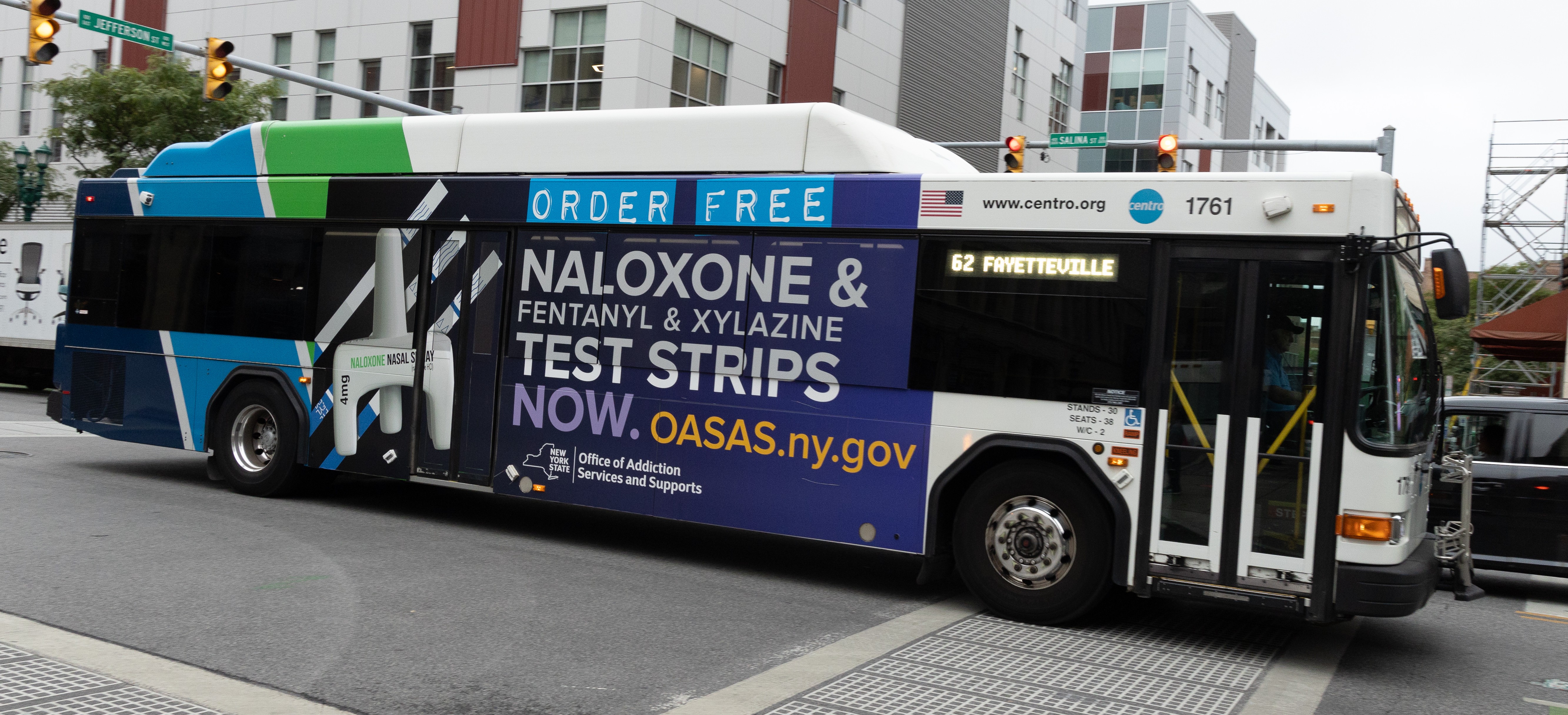 OpAD Media New York State Office of Addiction Services and Supports OASAS out-of-home transit bus wrap advertising campaign — multicultural public health outdoor media buying in New York
